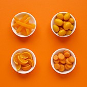 Orange produce in dishes