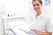 Female doctor using tablet