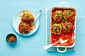 Baked peppers stuffed with couscous, raisins and dried apricots, vegan