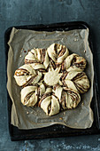 Unbaked chocolate spread bread flower with hazelnuts