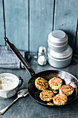Curried fish cakes with a yoghurt dip