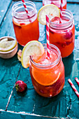 Strawberry lemonade in glass jars