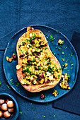 Stuffed butternut squash with hazelnuts and cranberries
