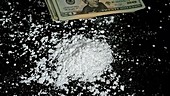 Heroin and banknotes, slow motion