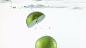 Apple in water, slow motion