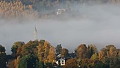 Autumn fog in a valley
