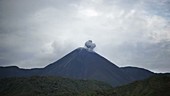 Reventador volcano erupting