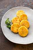 Breaded cheese rounds