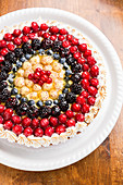 Berry cake with meringue dots