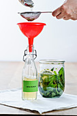 Mint syrup in a glass flask