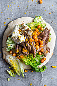 Pita bread with lamb, chickpeas and labneh (Greek)