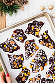 Homemade chocolate bark with almonds and dried fruits