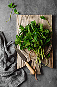 Fresh mint leaves on a chopping board