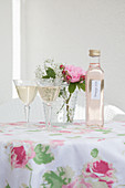 Two glasses of sparkling wine with homemade rose syrup
