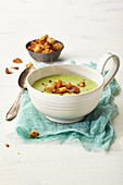Broccoli and cheese soup with croutons