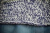 A hand-knitted jumper (detail of hem)