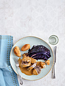 Veal knuckle with baked red cabbage and croquettes (low carb)
