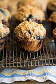 Blueberry muffins on a wire rack