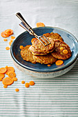 Carrot fritters in a ceramic bowl