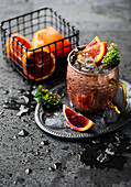 A Moscow Mule with blood orange slices