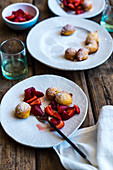 Lemon and ricotta fritters with strawberries in gin