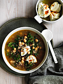 Chickpea, quinoa and kale soup with labne