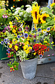 Summer bouquet with globe thistles (echinops) and Helenium