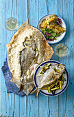 Salted sea bass, sea bream with ricotta, and seabream fillets with aromatic crumble