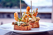 Canapes with shrimps and mushrooms