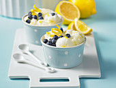 Lemonade pudding with blueberries and lemon zest