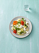 Cucumber salad with pineapple and feta