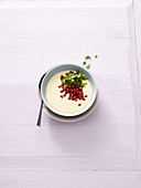 Potato soup with ginger and pomegranate seeds