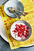 Red rubies in cold coconut milk (Singapore)
