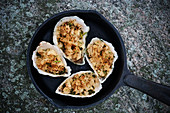 Oysters Rockefeller (gratinated oysters with spinach, USA)