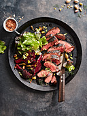 Beef fillet with beetroot, capers and pistachios
