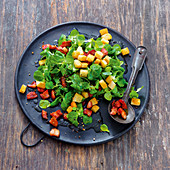 Corn salad with bacon and croutons