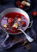 Hot fruit soup with plums