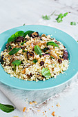 Couscous with vegetables, peppermint and coriander