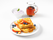 French toast with fruit and syrup