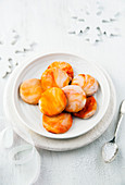 Orange biscuits with marbled orange icing