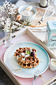 Wholemeal waffles with yoghurt sauce and blackberries