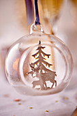 Stag and Christmas tree figurines in Christmas bauble