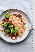 Chicken breast with broccoli and orange quinoa