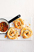 Lamb cinnamon and filo pies with pistachio honey dressing
