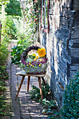 Autumn arrangement in basket with handle