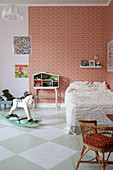 Chequered floor in vintage-style child's bedroom
