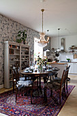 Classic dining area next to open-plan kitchen