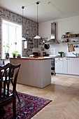 Open-plan kitchen-dining room in country-house style