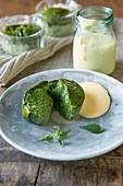 Green wild herb flan with cheese sauce (Aosta Valley)