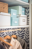 Storage boxes in DIY fitted wardrobe